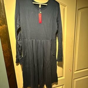 Size large navy blue long sleeve dress. Never worn brand new!